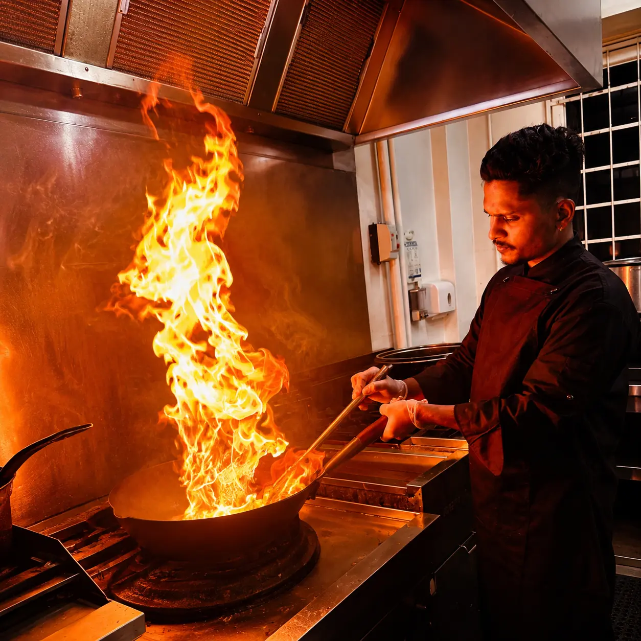 Chef mastering authentic Sri Lankan spices
