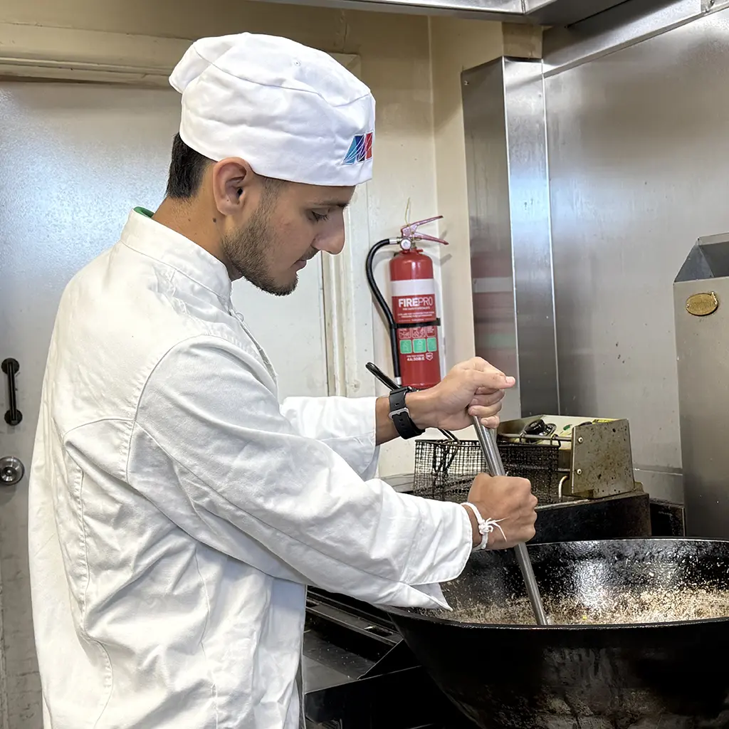 Skilled chef preparing food